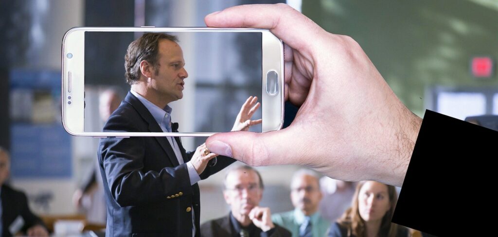 video recording, conference, public speaking, presentation, lecture, speaker, man, smartphone, screen, horizontal, technology, display, device, mobile, hand, holding, social media, business, live, communication, white, public speaking, public speaking, public speaking, public speaking, public speaking, lecture, speaker, speaker, speaker